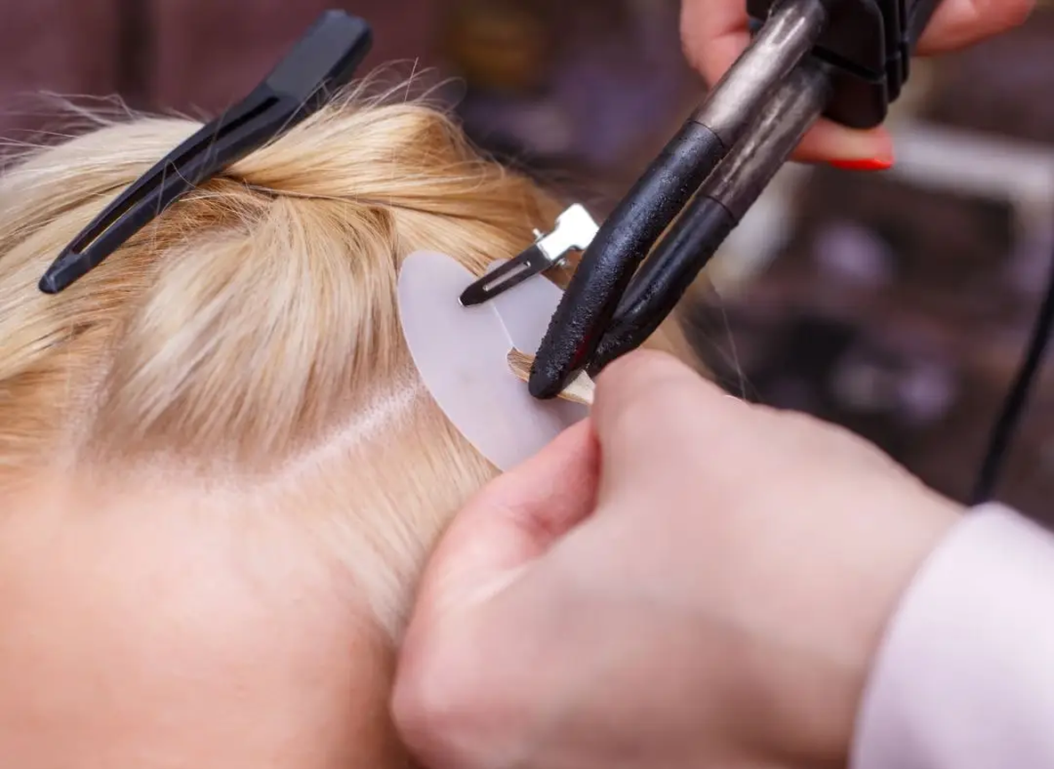 Woman wearing a natural-looking hair topper